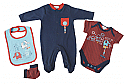 A set of baby clothes including a navy blue footed sleepsuit with a red pocket, a short-sleeve red and blue bodysuit with a robot print, a light blue bib with designs, and matching red and navy socks, all laid out on a white background.