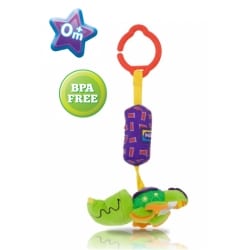 A colourful baby toy with a red plastic ring, a purple patterned fabric middle, and a green turtle-shaped bottom. A green "BPA FREE" badge and a blue star with "0m+" are near the toy, indicating it's safe for newborns.