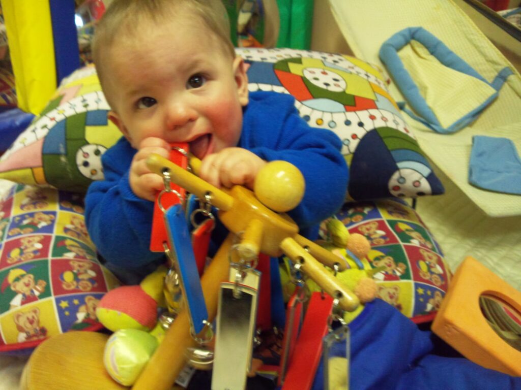 A baby with a toy.