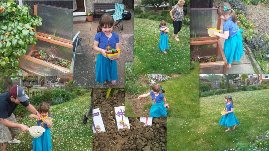 A young girl in a blue dress collects Easter eggs with a yellow basket in a garden, helped by adults. She searches grassy and flowered areas, finds chocolate eggs, and smiles happily. Raised beds, plants, and outdoor furniture are visible in the background.