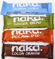 Four Nakd snack bars are stacked. From top to bottom, the flavours are Cashew Cookie (blue wrapper), Ginger Bread (green wrapper), Pecan Pie (orange wrapper), and Cocoa Orange (brown wrapper). Text highlights that they are gluten and dairy free.