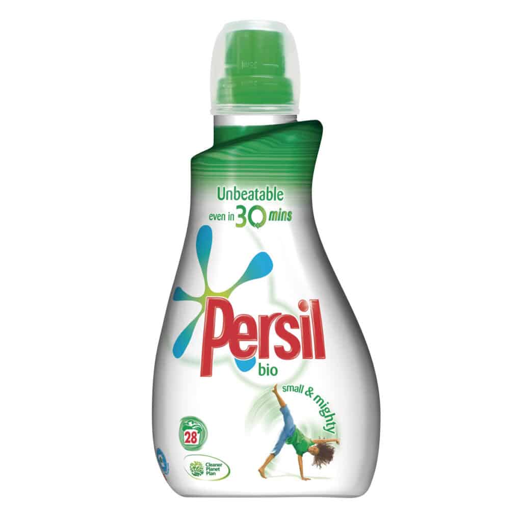 A white and green Persil Bio laundry detergent bottle with a green cap. The label reads “Unbeatable even in 30 mins,” shows the Persil logo, and features a child doing a cartwheel. Icons indicate 28 washes, plant-based stain removers, and recyclable packaging.