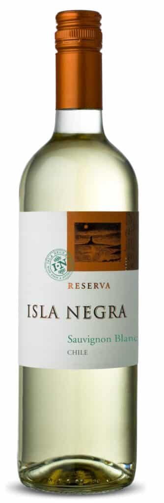 A clear glass bottle of Isla Negra Reserva Sauvignon Blanc wine from Chile, featuring a gold screw cap and a white label with gold and brown accents, text, and a small coastal image near the top. The wine inside appears pale yellow.