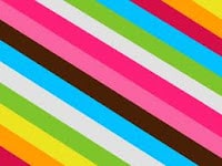 Diagonal stripes of varying thickness in bright colours—pink, red, yellow, orange, green, light blue, blue, white, black, and brown—run from the bottom left to the top right against a plain background, creating a vibrant, energetic pattern.