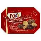 Red tin of Fox’s “Fabulously Special Selection” biscuits. The label features ornate gold script and images of assorted chocolate and cream-filled biscuits arranged in a pile on the right side. The background is deep red with decorative swirls.