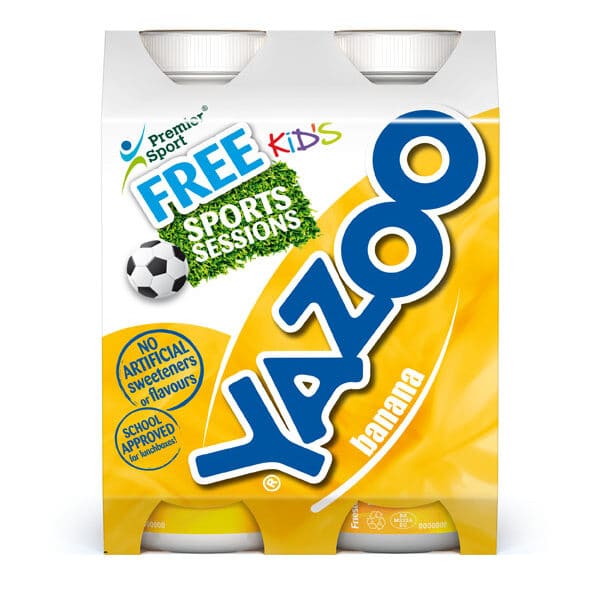 A four-pack of Yazoo banana milk drink in yellow packaging. The label features a large blue Yazoo logo, a football, “FREE KIDS SPORTS SESSIONS,” and notes about no artificial sweeteners or flavours and school approval.