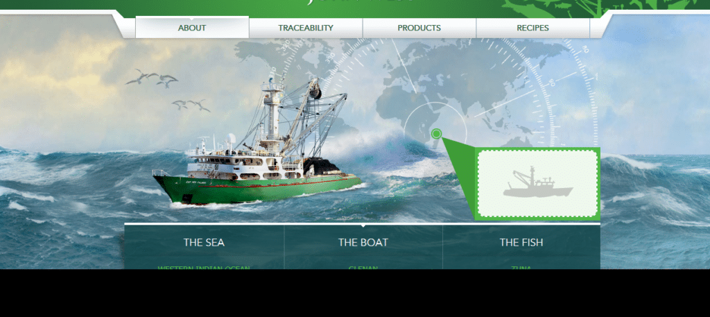 A green and white fishing boat sails on choppy blue ocean waves. Birds fly overhead. A semi-transparent world map is overlaid in the sky, with a green pin and inset highlighting the boat’s silhouette. Navigation tabs read: About, Traceability, Products, Recipes.