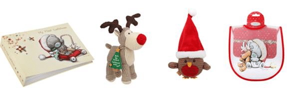 Four baby items are shown: a photo album with an elephant illustration, a plush reindeer toy, a small plush owl wearing a red Father Christmas hat, and a red and white bib featuring an elephant and Christmas biscuits.