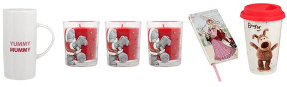 A white "Yummy Mummy" mug, three red candles in glass holders with a Christmas bear design, a notebook with a woman in a pink dress on the cover, and a white travel mug with a red lid and cartoon dog saying "Boofle".