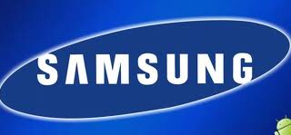 The image shows the Samsung logo with the word "SAMSUNG" in bold white letters inside a tilted blue oval on a blue gradient background. A small part of the green Android robot mascot peeks in from the bottom right corner.