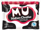 A packet of MU Mature Cheddar cheese with cow-print black and white spots, bold red and white lettering, and a blue quality seal in the lower right corner. Text reads, “Mature Cheddar, A Deliciously Tangy Mature Cheddar.”.
