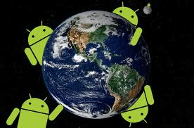 Illustration of planet Earth viewed from space with four large green Android robot logos surrounding it. The robots appear to be holding the planet. A small moon is visible in the background, all set against a dark starry sky.