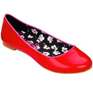 A shiny red ballet flat shoe with a slightly rounded toe, pink trim, and a light brown sole. The interior lining is black with a white and pink floral pattern. The shoe is positioned at an angle, showing both the outer side and the inner lining.
