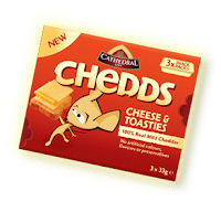 A red and orange box of Cathedral City Chedds Cheese & Toasties featuring an animated mouse holding a cheese toastie. The packaging says “100% Real Mild Cheddar,” “No artificial colours, flavours or preservatives,” and “3 x 33g.”.