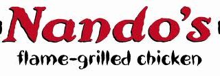 The image shows the Nando’s logo with the name “Nando’s” in bold red text adorned with green leaves on either side. Below, it reads “flame-grilled chicken” in a playful black font. The background is plain white.