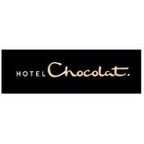 The image shows the Hotel Chocolat logo with “HOTEL” in white uppercase letters and “Chocolat.” in cream cursive, all on a black rectangular background.