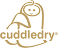 Simple tan line drawing of a smiling baby wrapped in a towel, with the word “cuddledry” in lowercase letters below. The towel and baby are stylised, forming a soft, comforting shape. The overall design conveys warmth and gentle care.