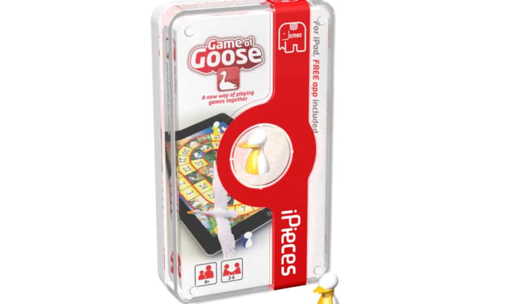 A rectangular box for "Game of Goose" by iPieces is shown. The packaging is mostly white and red, featuring images of a tablet displaying a game board and a yellow playing piece. The box advertises a free app and is meant for 2–4 players, ages 4 and over.