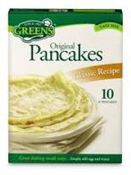 A box of Green’s Original Pancakes mix, classic recipe, showing a stack of thin pancakes on a white plate. The box advertises “10 pancakes” and has green, white, and yellow colours with cooking instructions at the bottom.