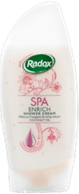 A white bottle of Radox SPA shower cream with a curved shape. The label features the green Radox logo at the top, pink floral designs, and text that reads: "SPA, EMBRACE, Shower Cream, Frangipani & Tiger Lily scent.
