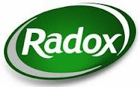 A green oval logo with a white border features the word “Radox” in bold white letters at the centre. The background of the oval transitions from dark to light green, creating a gradient effect.