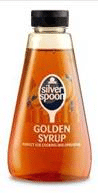 A clear plastic bottle of Silver Spoon Golden Syrup with a black cap. The thick amber syrup is visible inside. The label features the Silver Spoon logo and the words “Golden Syrup” with “Perfect for cooking and baking” written underneath.