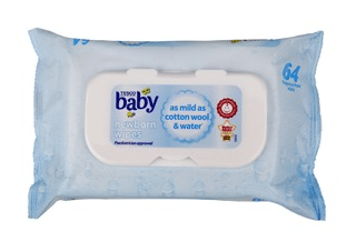 A pack of Tesco Baby newborn wipes in light blue packaging. The label reads “baby, as mild as cotton wool & water.” The pack features a plastic lid for easy access and contains 64 wipes. The packaging includes approval and award symbols.