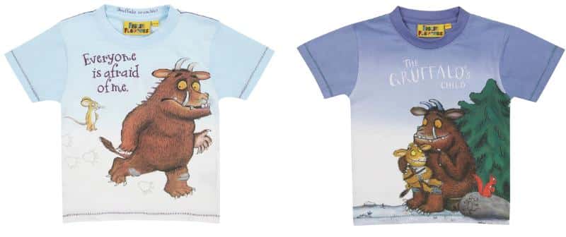 Two children’s T-shirts are shown. The left shirt is light blue, featuring the Gruffalo and Mouse with the text “Everyone is afraid of me.” The right shirt is purple, showing the Gruffalo and a smaller Gruffalo by a tree, with the text “The Gruffalo’s Child”.