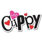 Logo with the words "My Clippy" in playful black letters. The “i” in “Clippy” is dotted with a pink heart with “My” written in white, and three red hearts are scattered around the text for a fun, cheerful look.