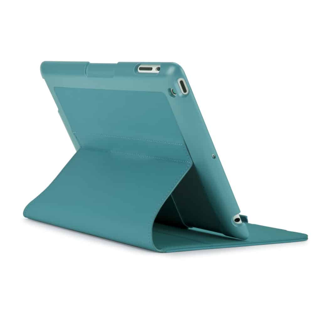 A teal tablet case holds a tablet upright in landscape orientation. The case forms a sturdy triangular stand, supporting the tablet at an angle. The device’s camera, headphone jack, and buttons are visible. The background is plain white.