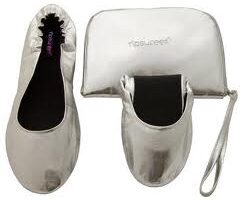 A pair of silver foldable ballet flats, one unfolded showing the full shoe and the other partially folded next to a matching silver zippered pouch with a wrist strap. The brand name "foldable" is visible on both the insole and pouch.