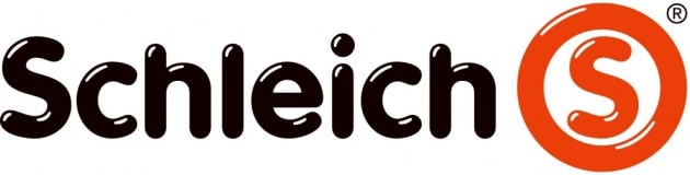 The image shows the Schleich logo with the word "Schleich" in bold, black rounded letters and a large orange circle containing a white "S" to the right of the text. The logo has a modern and playful appearance.