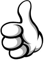 A cartoon-style hand with thick black outlines is giving a thumbs-up gesture. The palm faces forward, the thumb is raised, and the other fingers are curled inward. There are grey shaded areas for depth, and the background is plain white.
