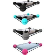 Four small, triangular tabletop football games are shown stacked vertically. Each game has a reflective surface, black frame, and three round corner bumpers in different colours: black, teal, grey, and pink. Small paddles and a ball are visible on each game.
