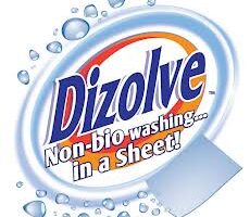 The image shows the Dizolve logo with blue water droplets surrounding the name "Dizolve." Below the logo, the text reads: "Non-bio washing... in a sheet!" on a white and blue circular background with orange accents.