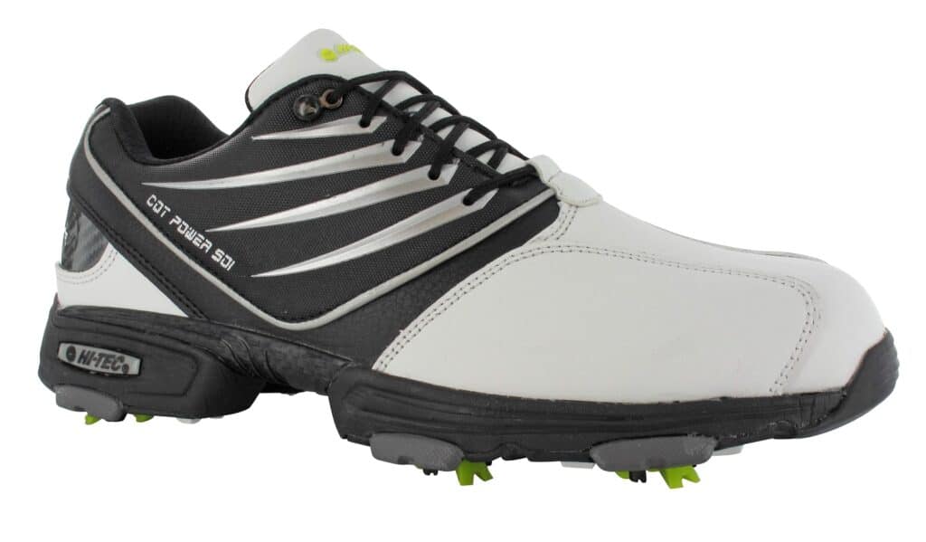 A white and black athletic golf shoe with black laces, white stripes, and green studs on the sole. The shoe has “COT POWER 50” text on the side and a padded collar, designed for comfort and grip on the golf course.