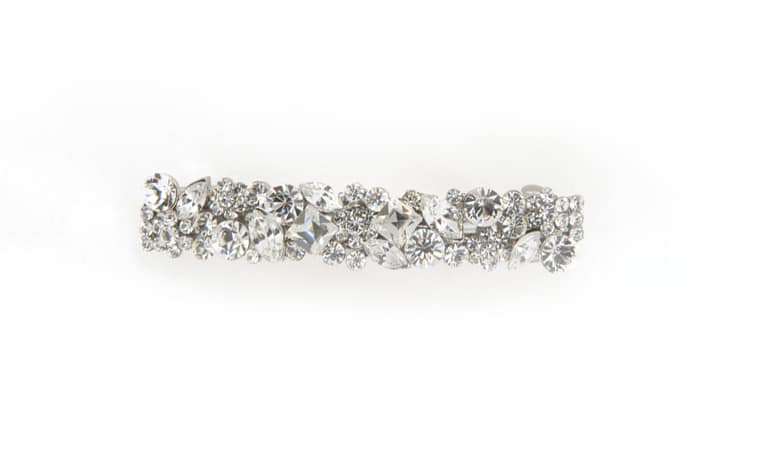 A silver hair barrette adorned with clustered, variously sized clear rhinestones and crystals, creating a sparkling, elegant, and textured appearance against a white background.