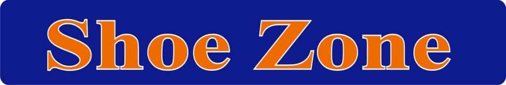 A blue rectangular sign displays the words "Shoe Zone" in large, orange serif letters outlined in white, centred against the solid blue background.