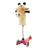 A child's three-wheeled pink scooter with a plush giraffe head attached to the handlebars. The giraffe has a tan face, brown spots, and black-tipped ears and horns. The scooter has two front wheels, one rear wheel, and an orange foot brake.
