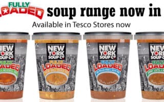 Four tubs of New York Soup Co. “Fully Loaded” soup are lined up in front of a white background. Text above reads: “New FULLY LOADED soup range now in store! Available in Tesco stores now.” Each tub displays a different soup flavour.