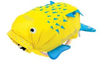 A bright yellow and blue children’s rucksack shaped like a fish, featuring a large smiling face, blue fins, a tail, and triangular blue spots on its body. The bag has zip compartments and playful, cartoonish details.