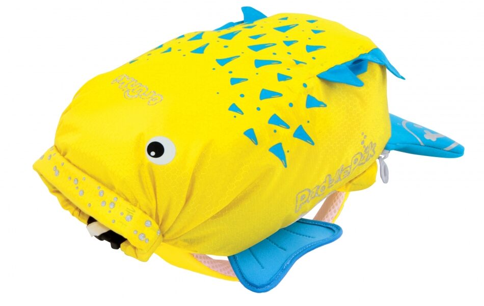 A bright yellow and blue children’s rucksack shaped like a fish, featuring a large smiling face, blue fins, a tail, and triangular blue spots on its body. The bag has zip compartments and playful, cartoonish details.
