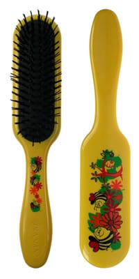 A yellow hairbrush with a black handle.