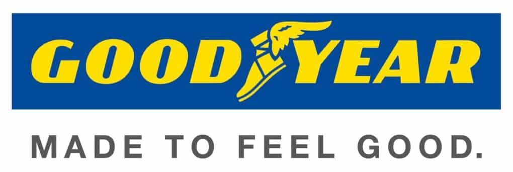Goodyear logo with bold yellow text on a blue background. The winged foot symbol appears between “GOOD” and “YEAR.” Below, grey text reads “MADE TO FEEL GOOD.” on a white background.