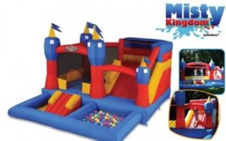 A colourful inflatable play structure named "Misty Kingdom" features blue, red, and yellow sections with castle turrets, a small slide, ball pit, and mesh windows. Two inset photos show children enjoying the bouncy castle and slide. Text reads "Misty Kingdom.