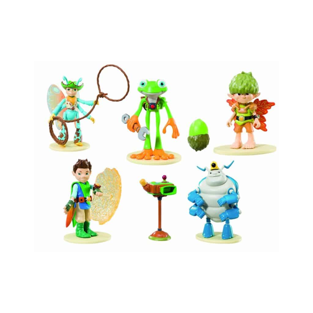 Six colourful toy figures are arranged on cream bases: two boys in fancy dress, a fairy with a lasso, a green frog-like character, a furry orange creature, a blue-and-white robot, and an egg-shaped object with a gadget on a stand.