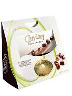 A white box of Guylian Belgian Chocolates with a green swirl design, showing an image of assorted chocolate seashells. The brand name “Guylian” and “Belgian Chocolates” are displayed in gold lettering on the front above a clear round window.