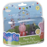 A packaged Peppa Pig toy labelled "Peppa Pig’s Theme Park Figures." The packaging shows a cartoon Ferris wheel and bunting in the background, with Peppa Pig and another character visible through the clear plastic front.