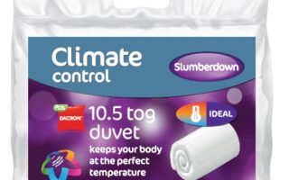 A clear plastic packet contains a rolled white duvet. The label reads “Climate control Slumberdown 10.5 tog duvet, keeps your body at the perfect temperature.” Icons indicate “ECO DACRON” and “IDEAL.” The background is purple with glowing dots.