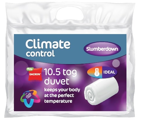 A clear plastic packet contains a rolled white duvet. The label reads “Climate control Slumberdown 10.5 tog duvet, keeps your body at the perfect temperature.” Icons indicate “ECO DACRON” and “IDEAL.” The background is purple with glowing dots.